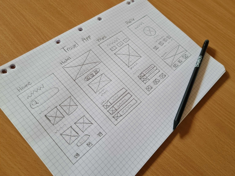 Handritad wireframe på rutat papper