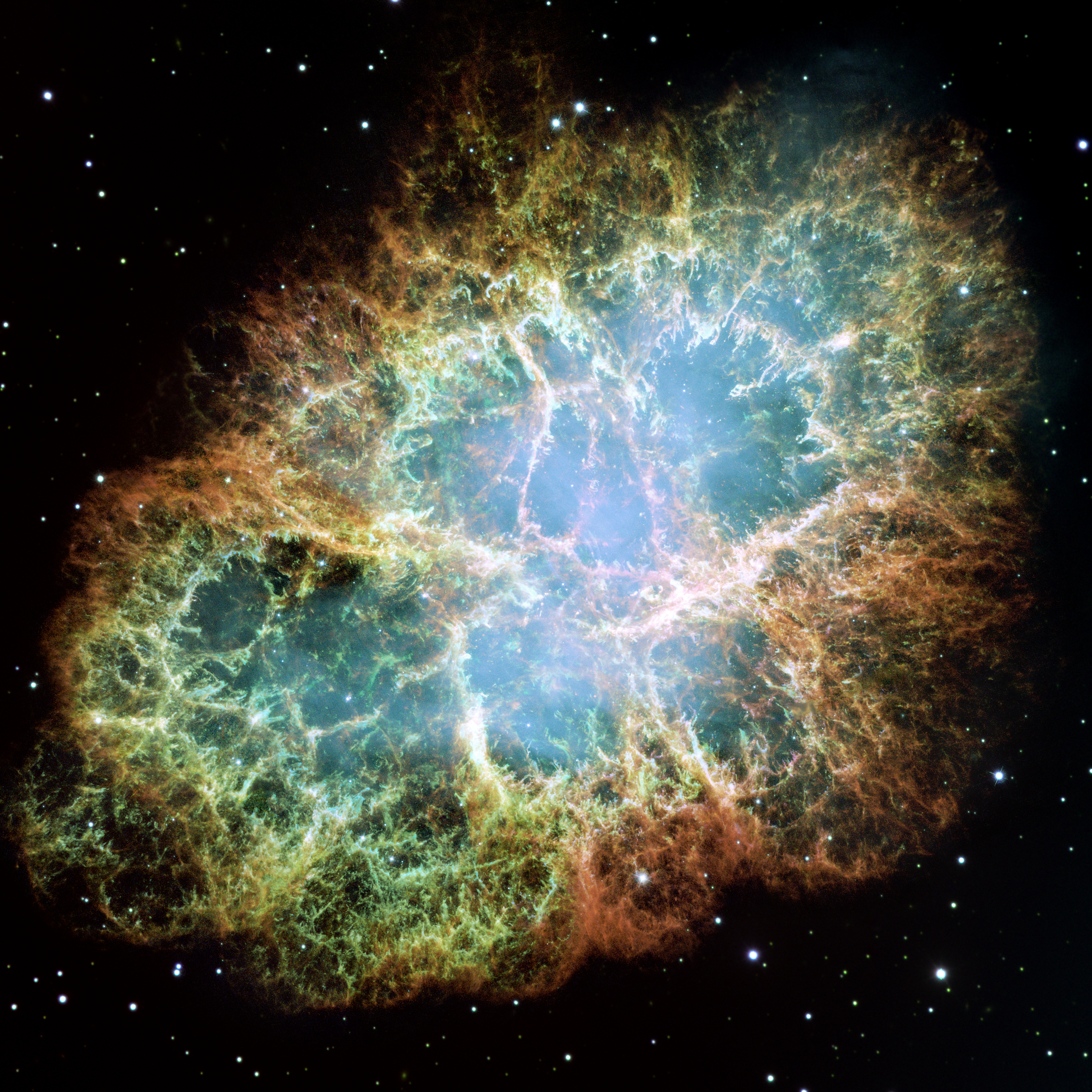 Krabbnebulosans färgrika gasmoln och filament.